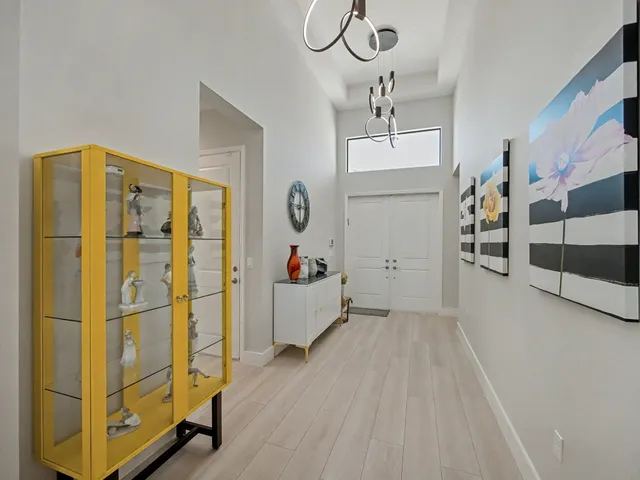 a living room with fireplace furniture and a flat screen tv