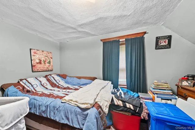 a bed room with a bed and a closet