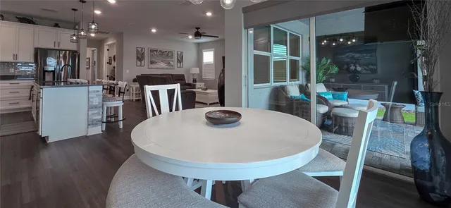 a bedroom with a bed and flat screen tv