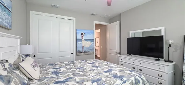 a view of a patio with a table chairs and a umbrella