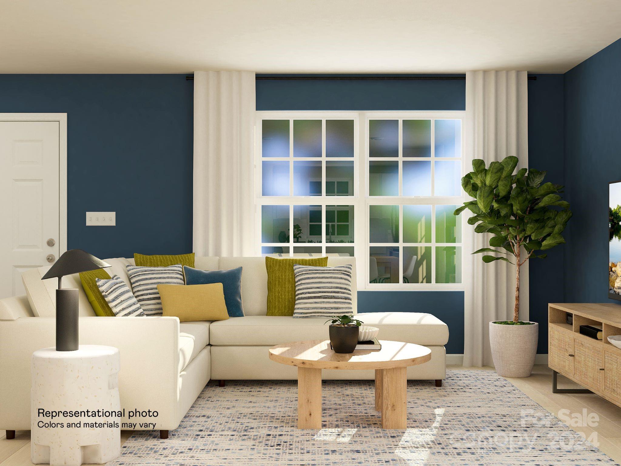 679 Mile Crk Road, Unit 101 Edgemoor, SC 29712 - Photo 13 of 21 a living room with furniture and a potted plant