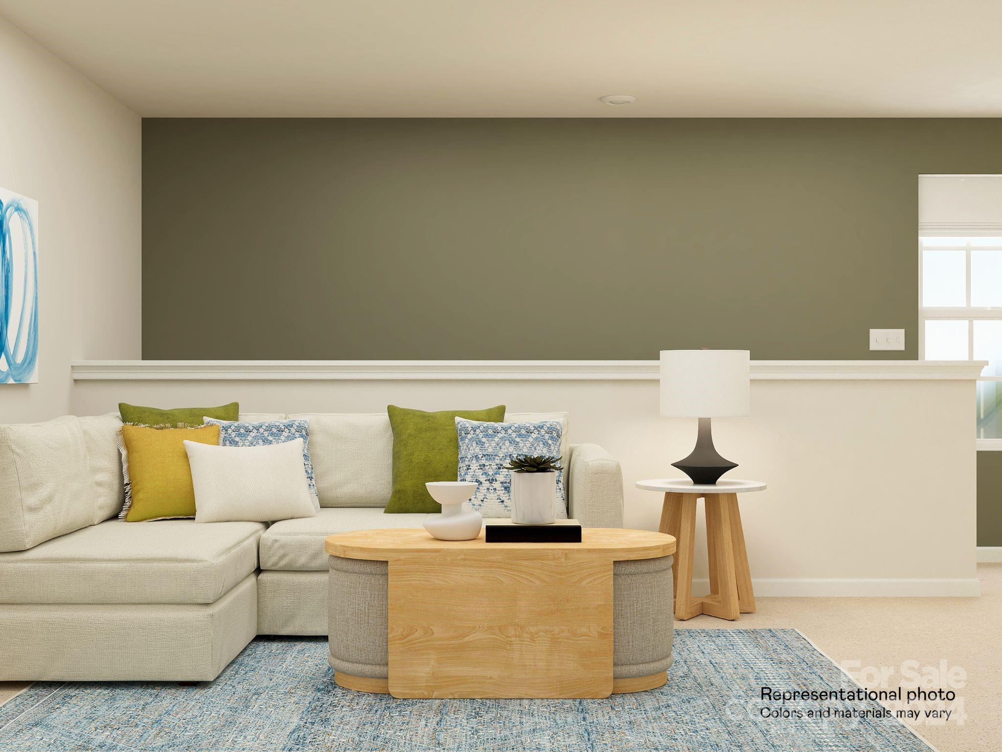 679 Mile Crk Road, Unit 101 Edgemoor, SC 29712 - Photo 15 of 21 a living room with furniture and a potted plant