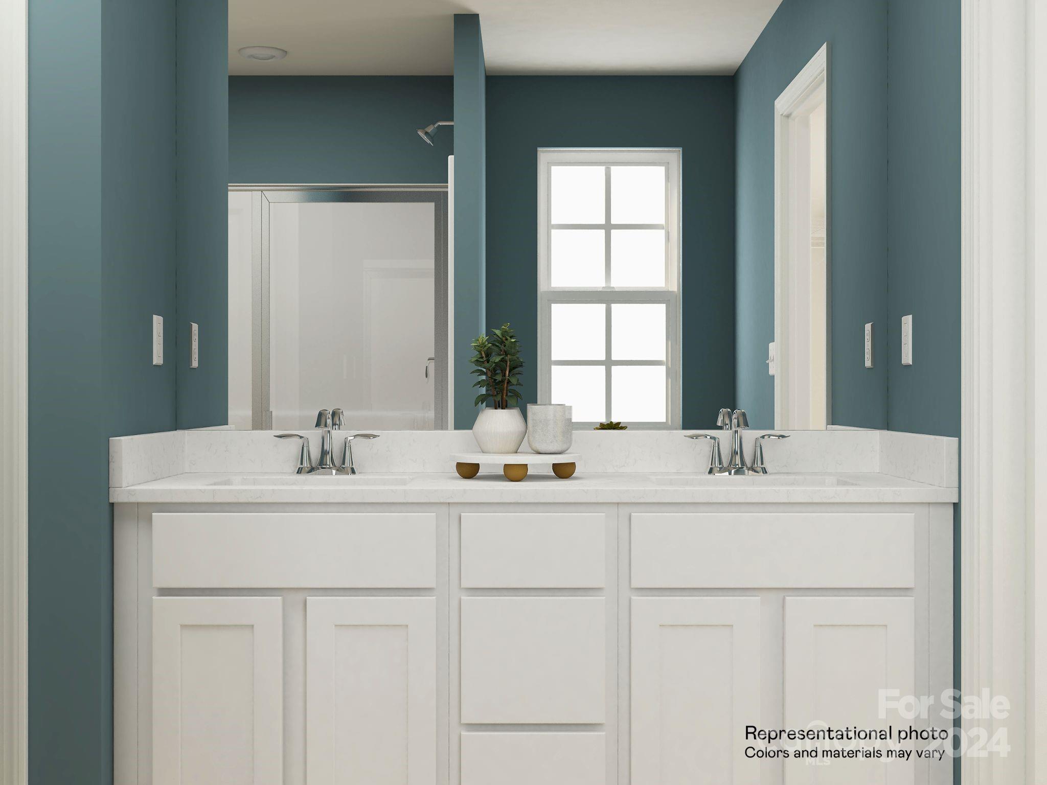679 Mile Crk Road, Unit 101 Edgemoor, SC 29712 - Photo 16 of 21 a bathroom with double sink and a mirror