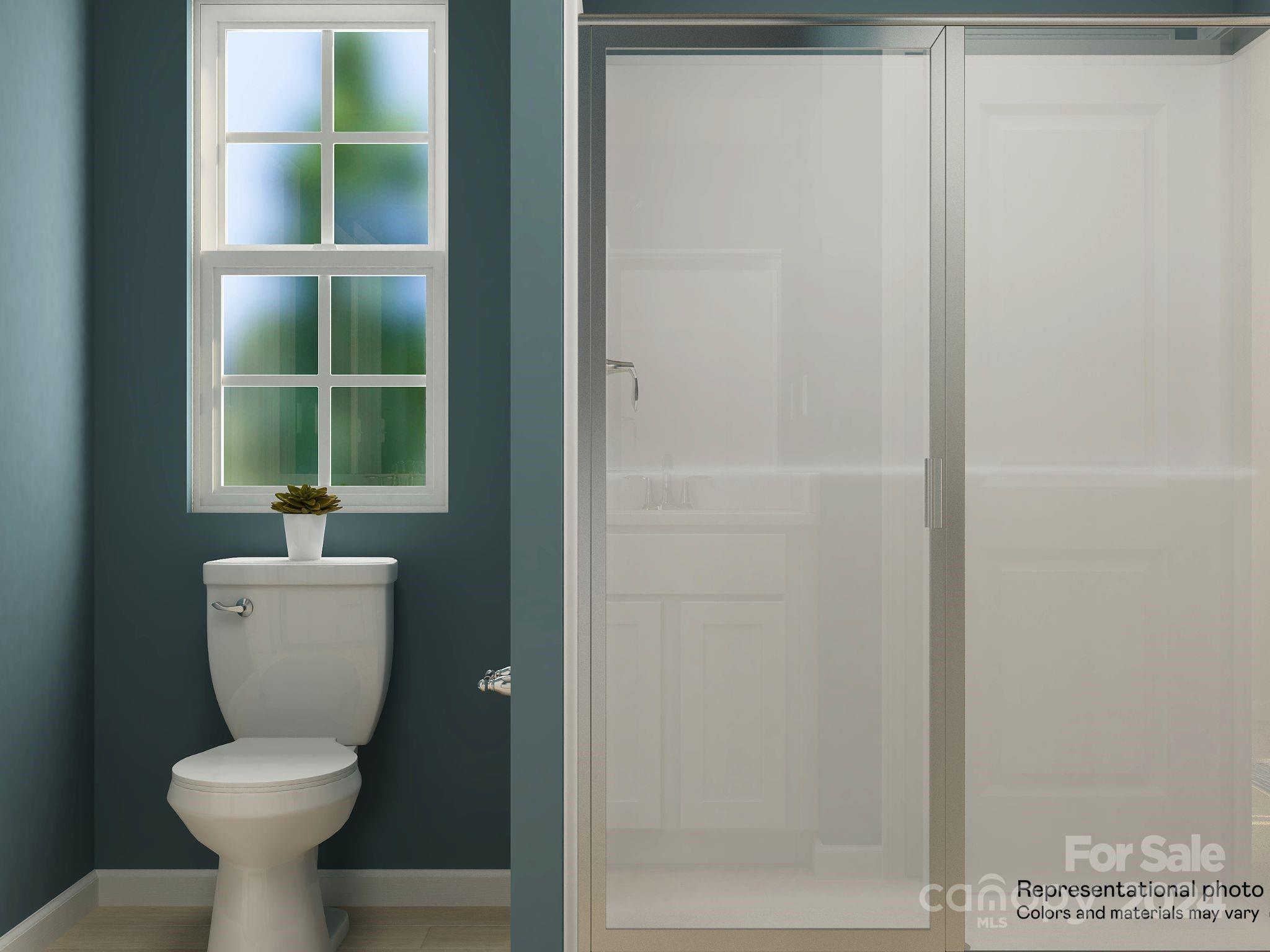 679 Mile Crk Road, Unit 101 Edgemoor, SC 29712 - Photo 17 of 21 a bathroom with a toilet