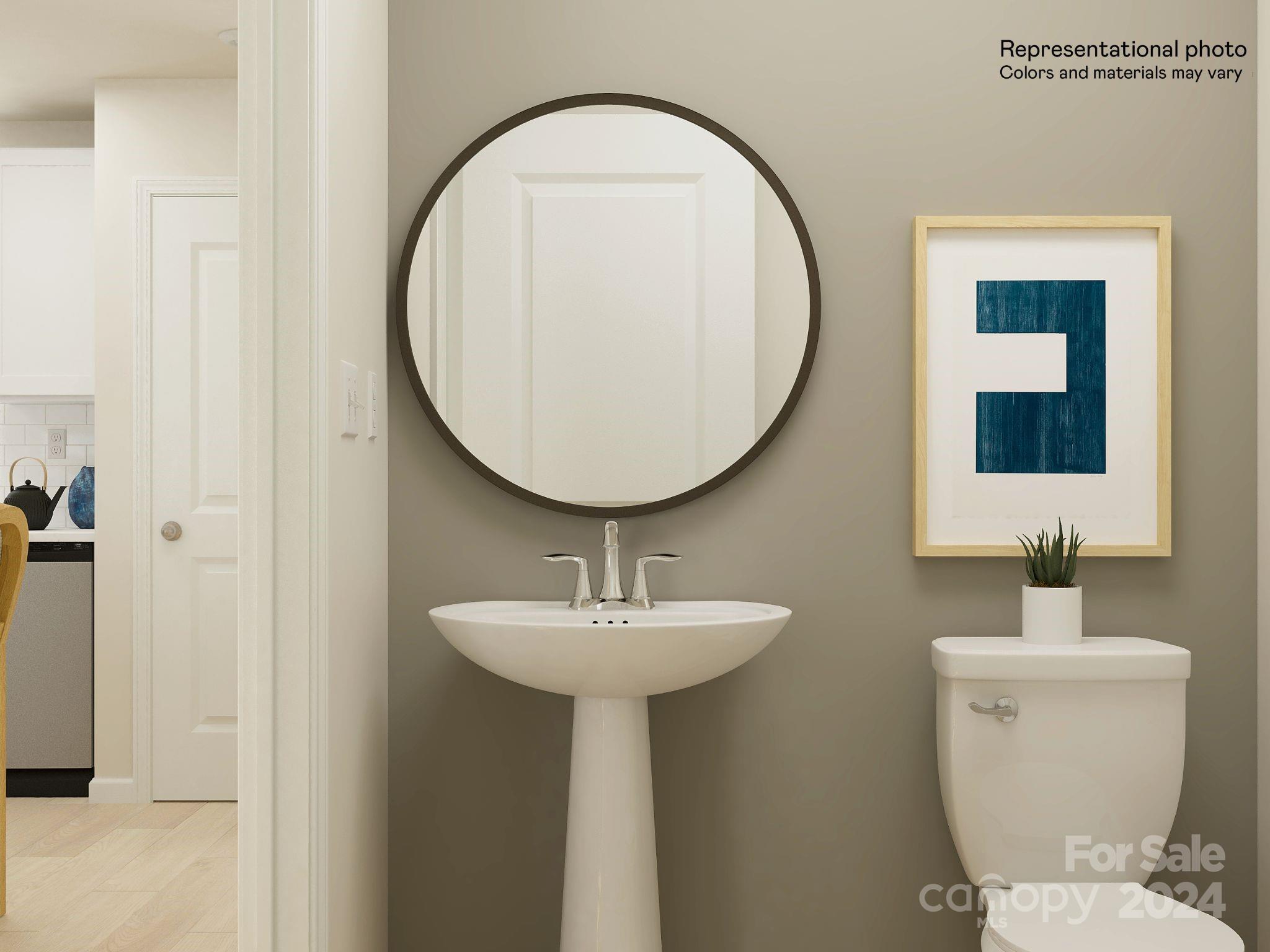 679 Mile Crk Road, Unit 101 Edgemoor, SC 29712 - Photo 21 of 21 a bathroom with a toilet sink and mirror