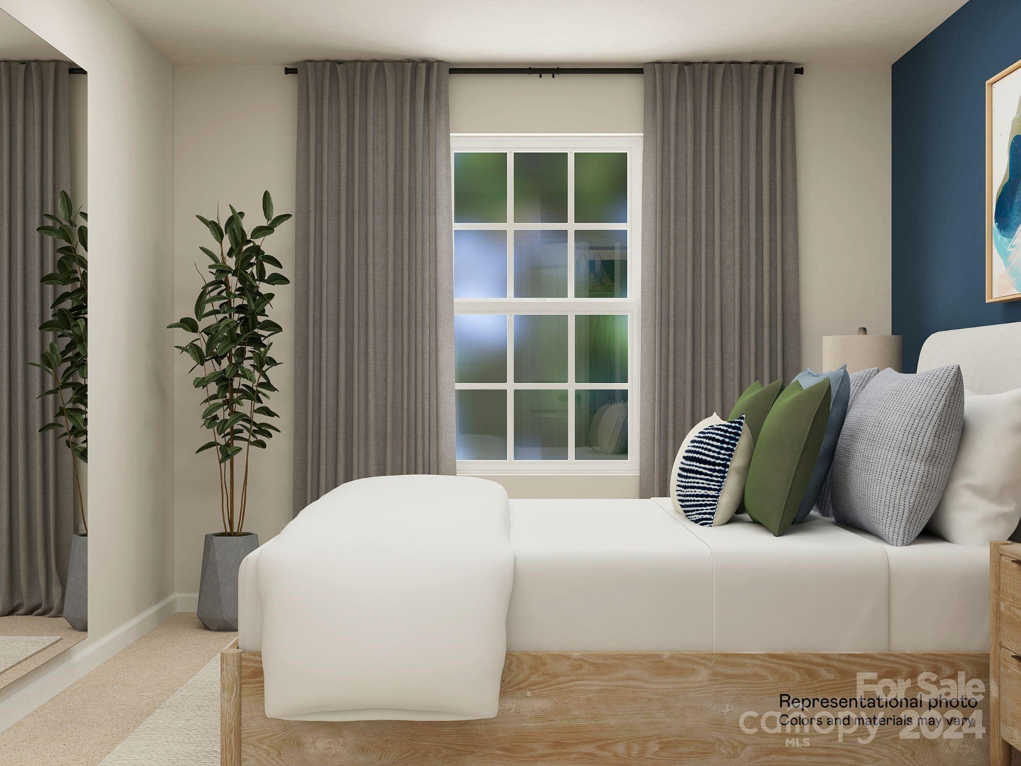 679 Mile Crk Road, Unit 101 Edgemoor, SC 29712 - Photo 6 of 21 a bedroom with a bed and a window