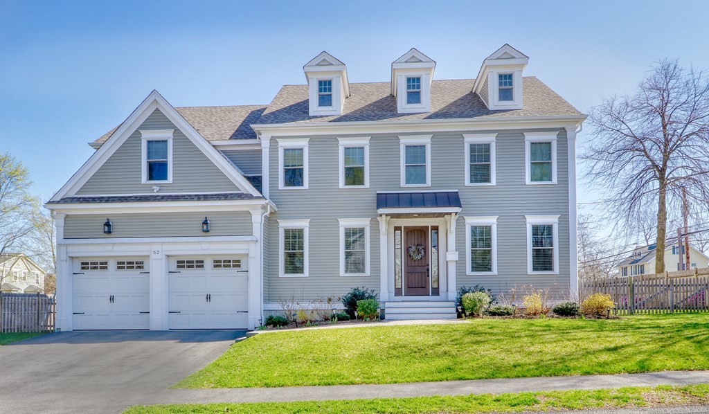 52 Thorpe Road Needham, MA 02494 - Photo 1 of 39 a front view of a house with a yard