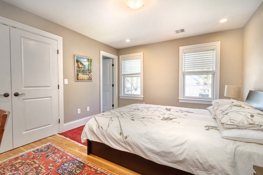 52 Thorpe Road Needham, MA 02494 - Photo 16 of 39 a bedroom with a bed and a window