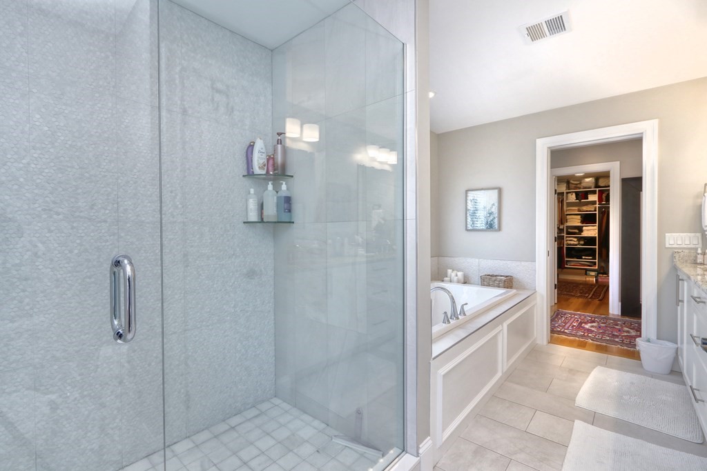 52 Thorpe Road Needham, MA 02494 - Photo 22 of 39 a bathroom with a tub sink and mirror