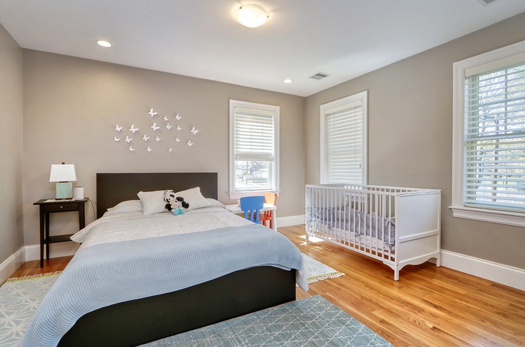 52 Thorpe Road Needham, MA 02494 - Photo 29 of 39 a bedroom with a bed and a window