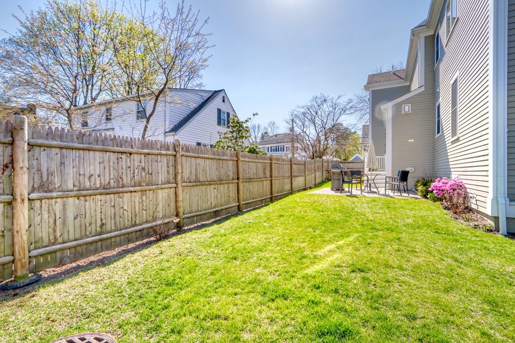 52 Thorpe Road Needham, MA 02494 - Photo 36 of 39 a view of backyard with wooden fence