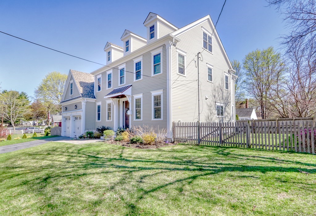 52 Thorpe Road Needham, MA 02494 - Photo 38 of 39 a front view of a house with a yard
