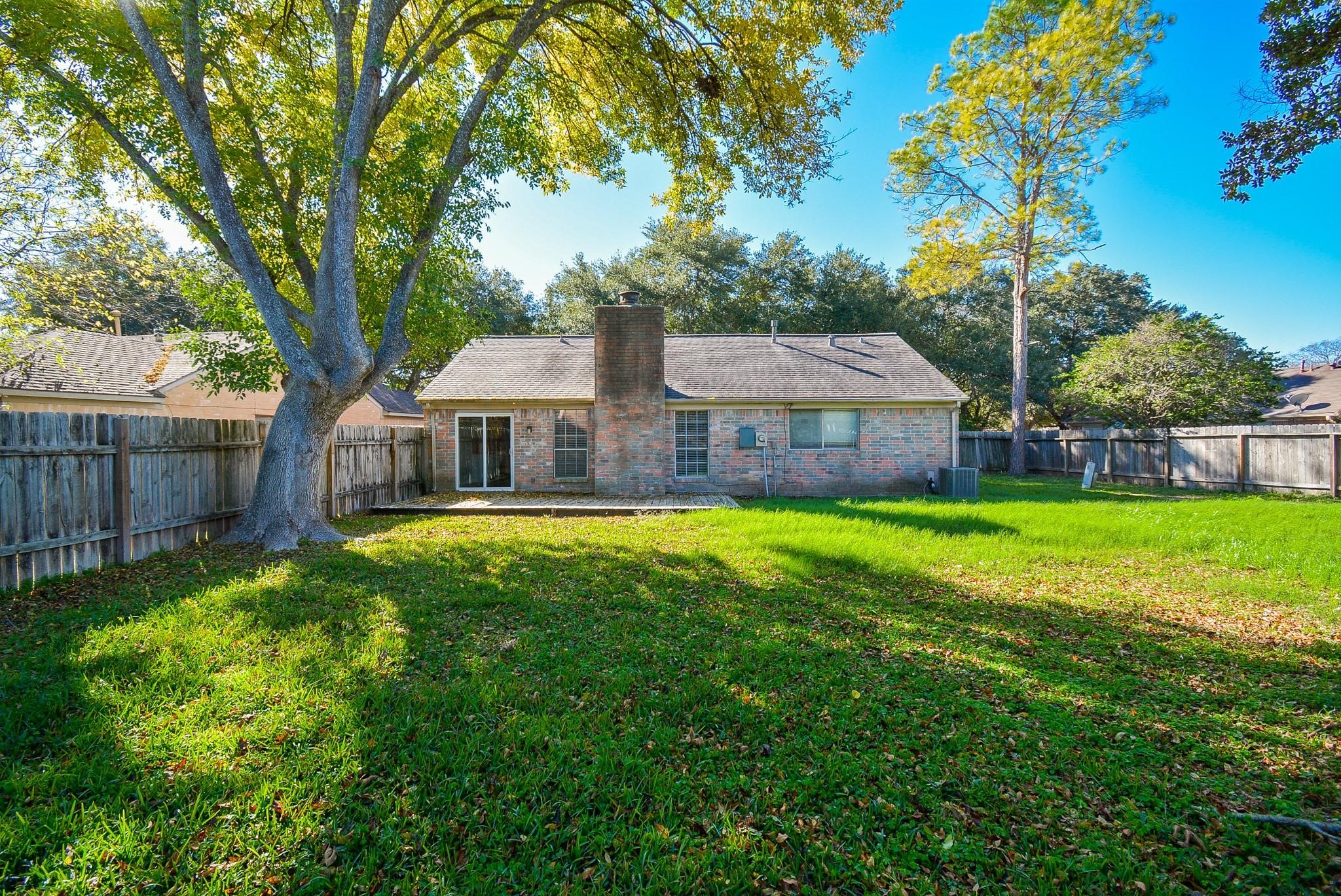 3911 Issacks Way Sugar Land, TX 77479 - Photo 17 of 18 Spacious backyard perfect for entertaining or hosting family.
