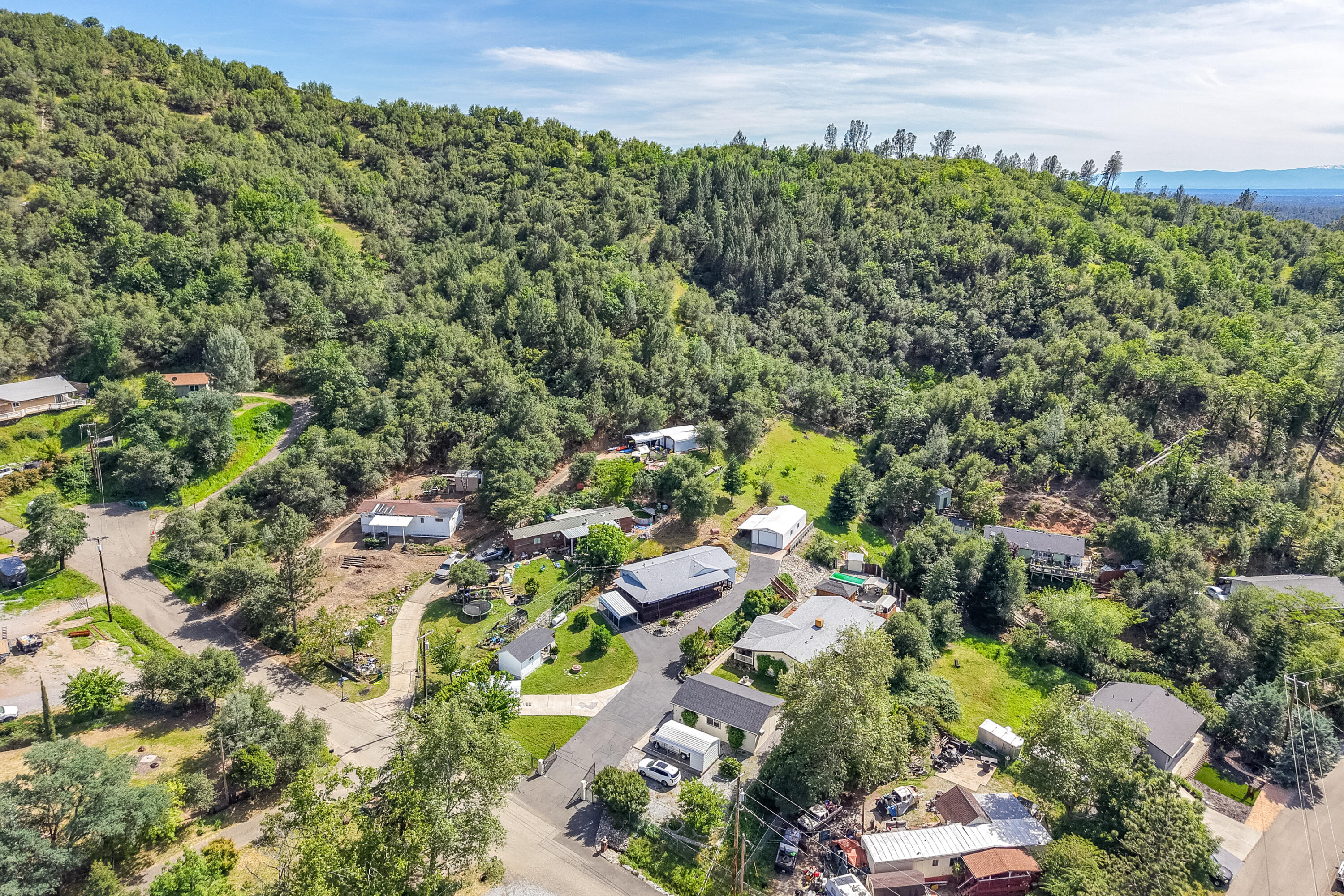 22151 Ravine Court Redding, CA 96003 - Photo 34 of 34 a picture of street view with lots of trees