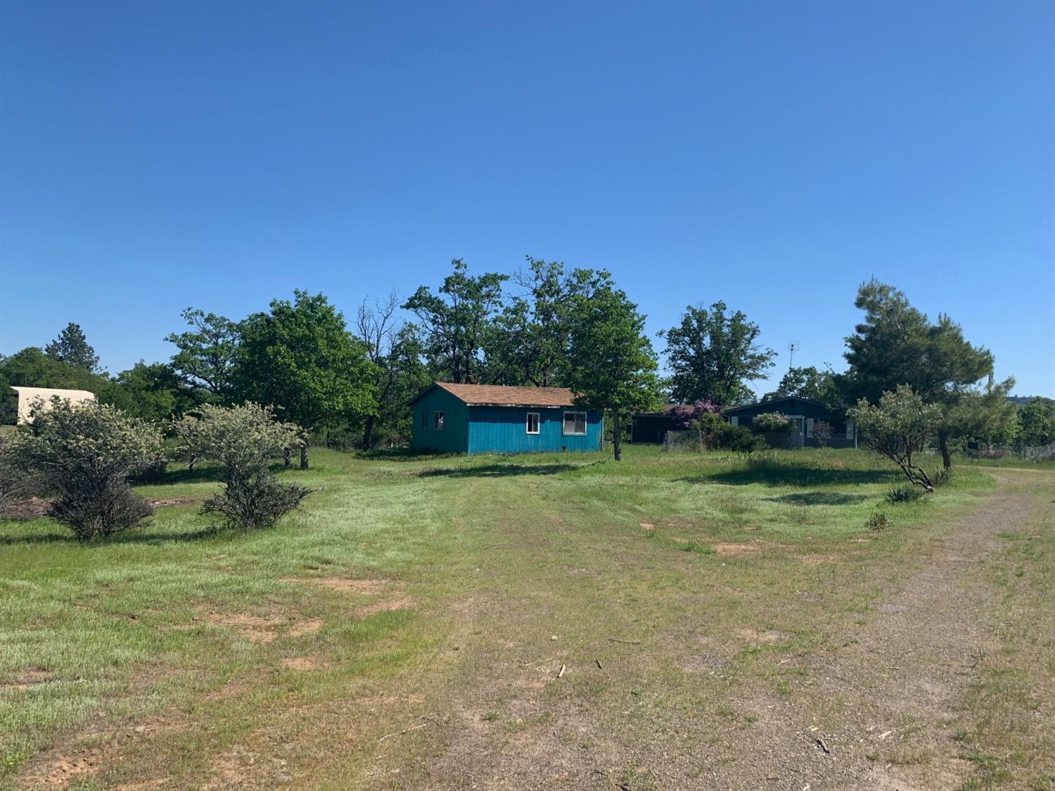 5715 Beagle Road White City, OR 97503 - Photo 2 of 12 a fire hydrant in the middle of a field
