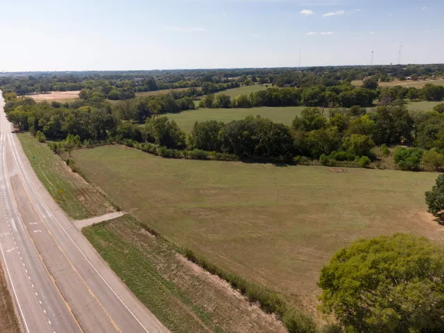 a view of a lake with mountains in the background