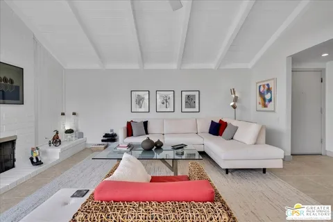 a living room with furniture and a couch