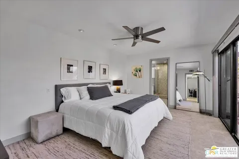 a bathroom with a sink double vanity and shower