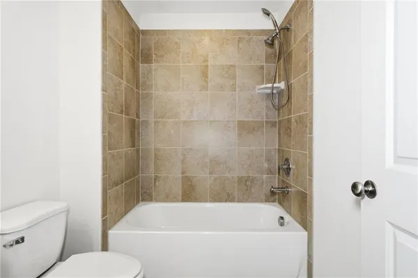 a view of a washer and dryer in a utility room