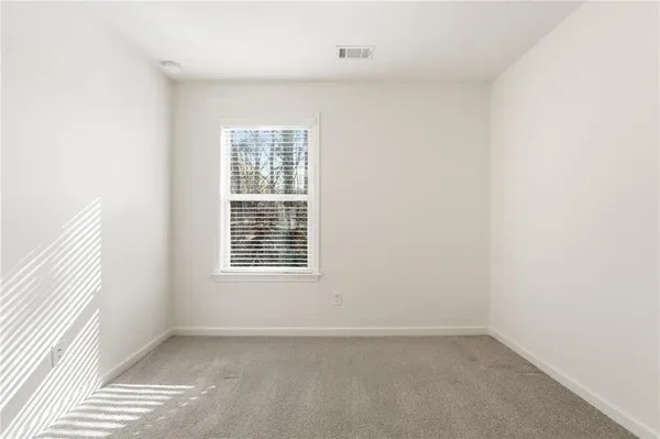 a view of a room with an empty space