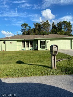 17413 Lebanon Road Fort Myers, FL 33967 - Photo 1 of 17 a front view of a house with a yard