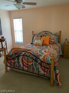 17413 Lebanon Road Fort Myers, FL 33967 - Photo 8 of 17 a bed sitting in a bedroom next to a window