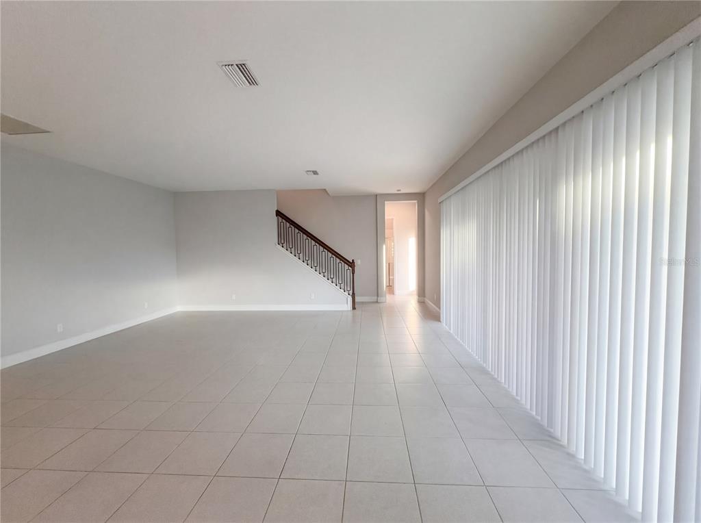 11277 Rustic Timber Loop San Antonio, FL 33576 - Photo 12 of 55 a view of a livingroom with an entryway