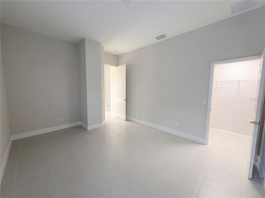 11277 Rustic Timber Loop San Antonio, FL 33576 - Photo 17 of 55 a view of an empty room