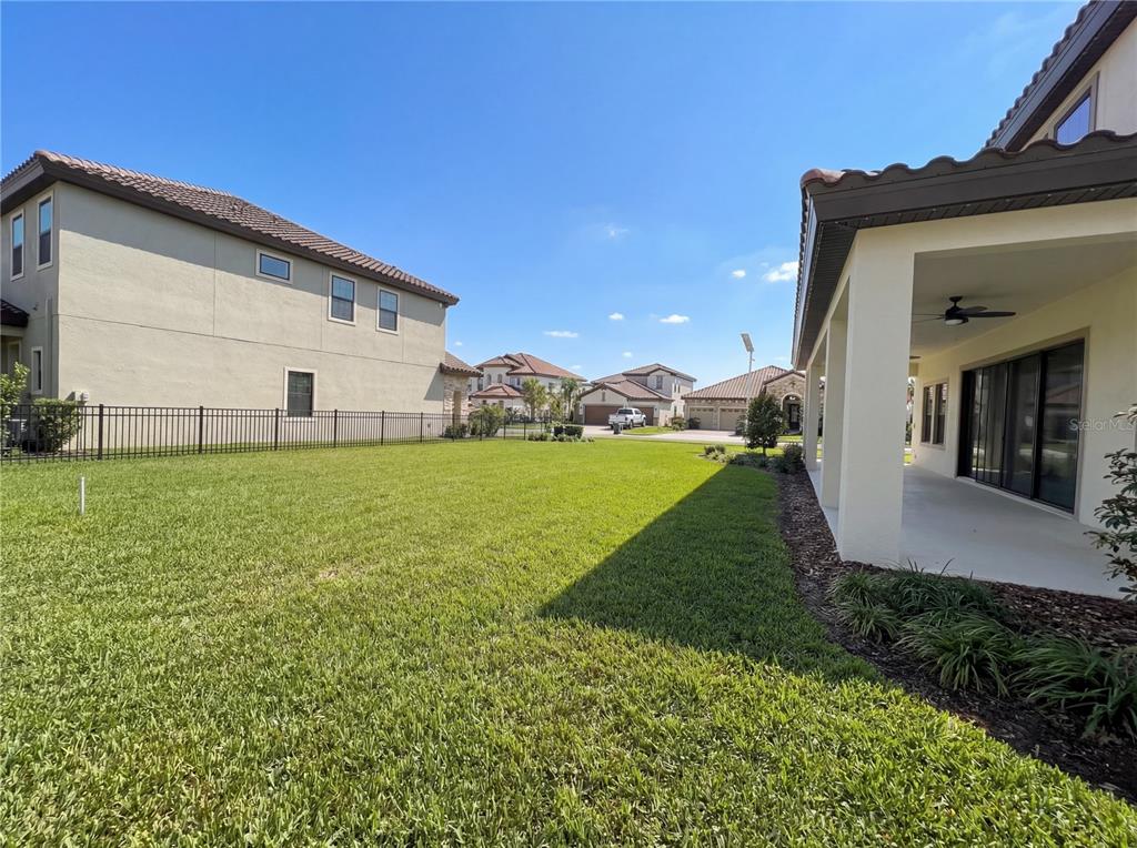 11277 Rustic Timber Loop San Antonio, FL 33576 - Photo 23 of 55 a view of a house with backyard and garden