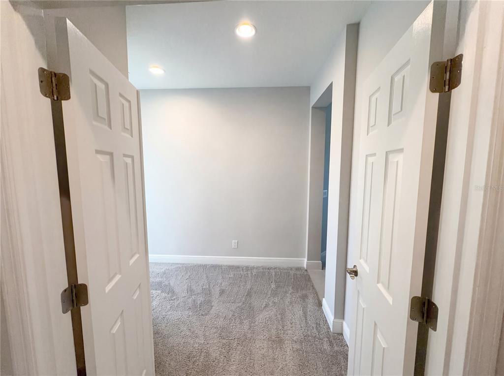 11277 Rustic Timber Loop San Antonio, FL 33576 - Photo 52 of 55 a view of a hallway with a elevator