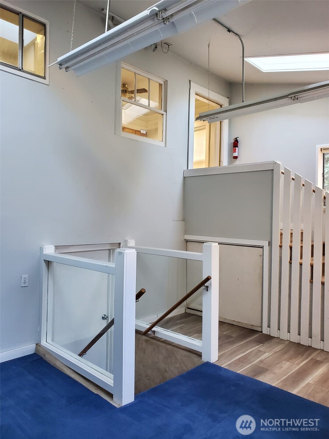2424 South Graham Street Seattle, WA 98108 - Photo 13 of 23 a view of entryway and hall with wooden floor