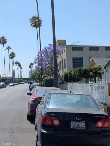 a view of a patio with a table and chairs