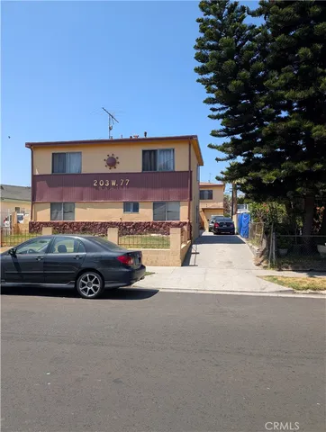a car parked in front of a building
