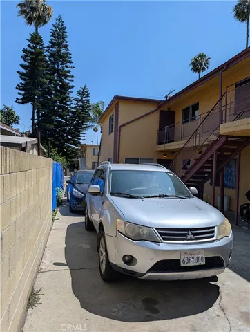 a car parked in front of a house