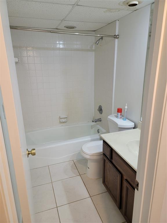 1800 Northeast 39th Court, Unit 1001 Pompano Beach, FL 33064 - Photo 12 of 39 a bathroom with a sink a toilet and shower