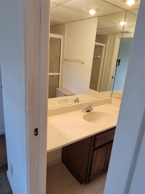 1800 Northeast 39th Court, Unit 1001 Pompano Beach, FL 33064 - Photo 15 of 39 a bathroom with a sink vanity and a mirror