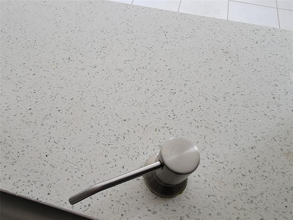 1800 Northeast 39th Court, Unit 1001 Pompano Beach, FL 33064 - Photo 20 of 39 a bathroom with a toilet and a shower