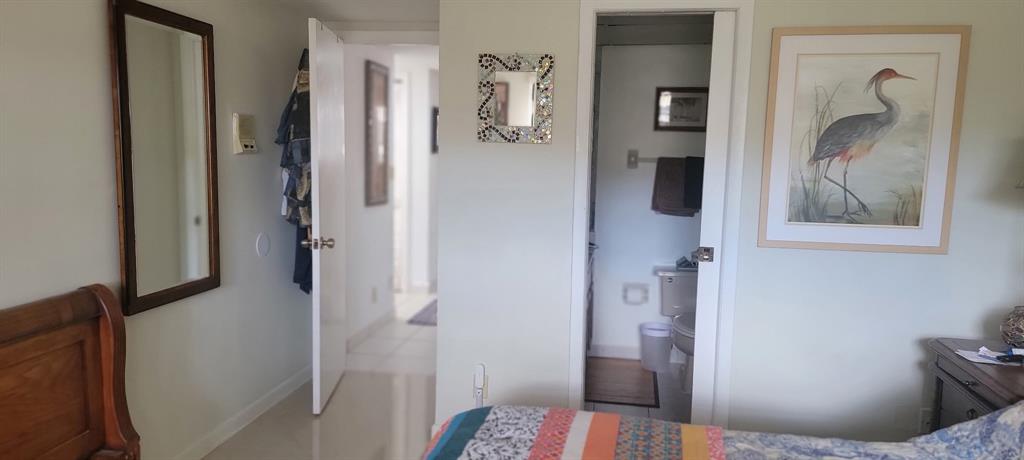 1800 Northeast 39th Court, Unit 1001 Pompano Beach, FL 33064 - Photo 25 of 39 a living room with furniture and a window