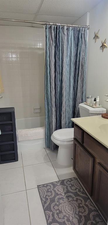 1800 Northeast 39th Court, Unit 1001 Pompano Beach, FL 33064 - Photo 28 of 39 a bathroom with a sink a toilet a mirror and shower