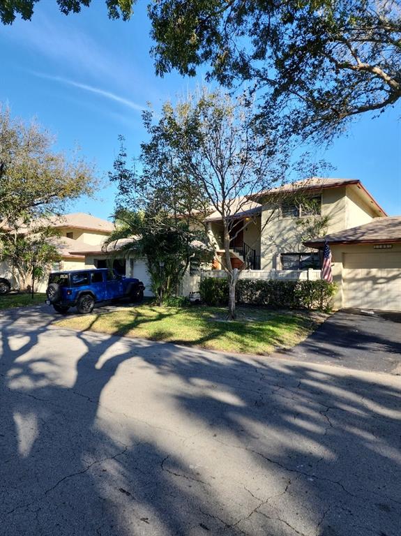1800 Northeast 39th Court, Unit 1001 Pompano Beach, FL 33064 - Photo 3 of 39 a view of a swimming pool with an outdoor space
