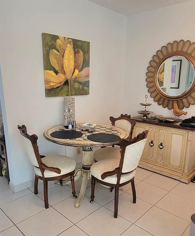 1800 Northeast 39th Court, Unit 1001 Pompano Beach, FL 33064 - Photo 37 of 39 a view of a kitchen area with sink