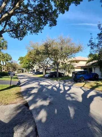 a view of a street with houses