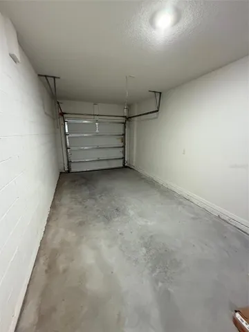 a view of room and racks on the wall