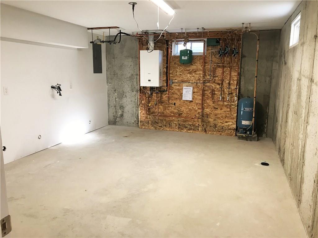 51 Dr Mann Road Augusta, ME 04330 - Photo 30 of 35 The utility room is large and would...