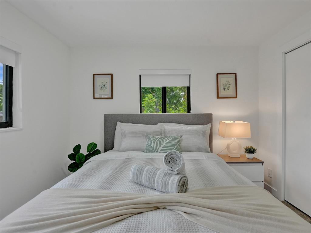 260 Northwest 36th Street Boca Raton, FL 33431 - Photo 12 of 35 a bedroom with a bed and window