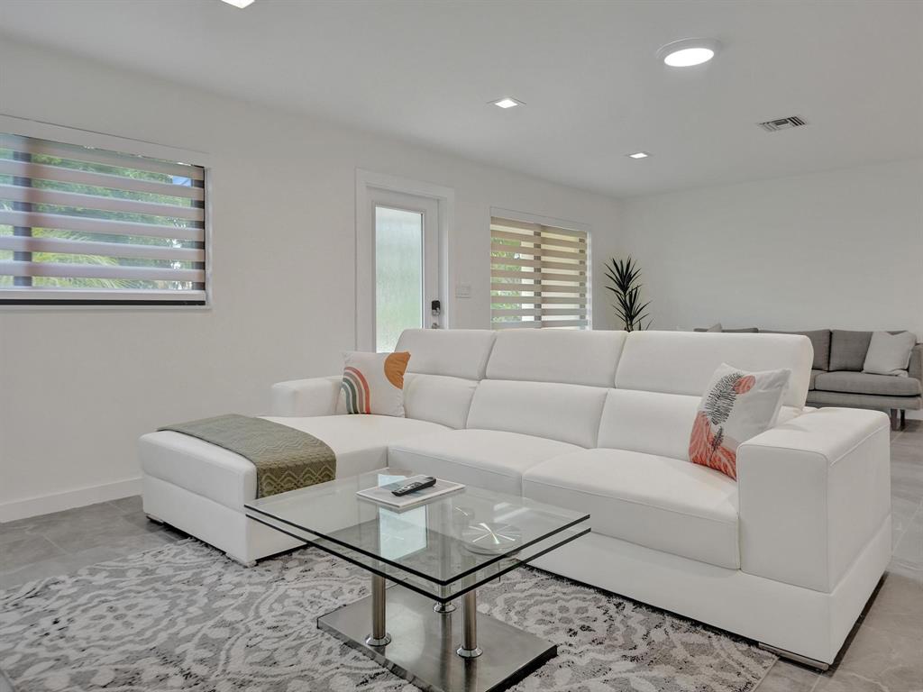 260 Northwest 36th Street Boca Raton, FL 33431 - Photo 18 of 35 a living room with furniture and a window