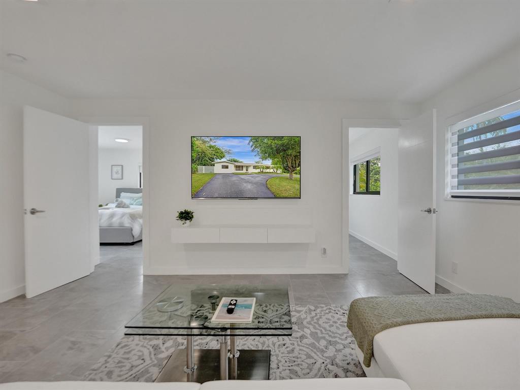 260 Northwest 36th Street Boca Raton, FL 33431 - Photo 19 of 35 a living room with furniture and a couch