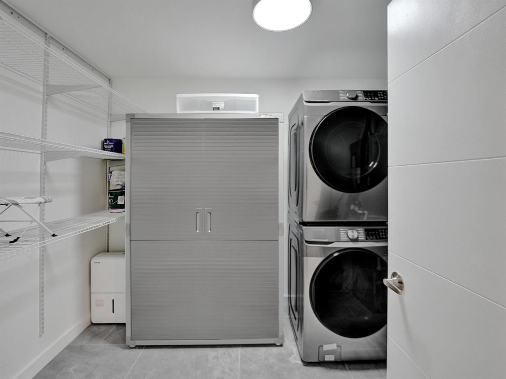 260 Northwest 36th Street Boca Raton, FL 33431 - Photo 25 of 35 a utility room with dryer and washer