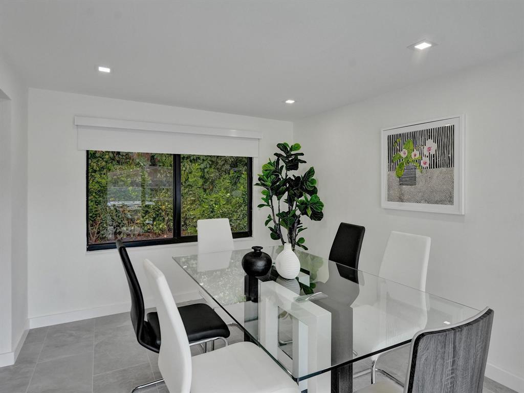 260 Northwest 36th Street Boca Raton, FL 33431 - Photo 26 of 35 a work room with furniture and a potted plant