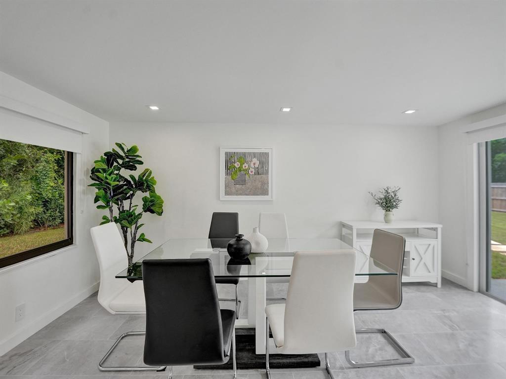260 Northwest 36th Street Boca Raton, FL 33431 - Photo 27 of 35 a view of a workspace with furniture and a potted plant